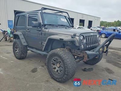 Czwarte zdjęcie samochodu z boku: 2017 JEEP WRANGLER SPORT VIN:1C4AJWAG2HL553274 - miniatura