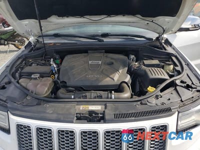 Zdjęcie 12 z 13 samochodu: 2014 JEEP GRAND CHEROKEE SUMMIT VIN:1C4RJFJM9EC300036 - miniatura