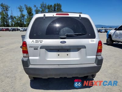 Zdjęcie 6 z 13 samochodu: 2003 FORD ESCAPE XLT VIN:1FMYU03133KD07226 - miniatura