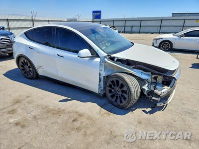 Czwarte zdjęcie samochodu z boku: 2024 TESLA MODEL Y VIN:7SAYGAEE5RF041279 - miniatura