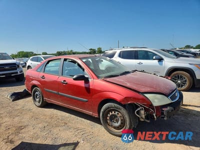 Czwarte zdjęcie samochodu z boku: 2005 FORD FOCUS ZX4 VIN:1FAFP34N65W130825 - miniatura