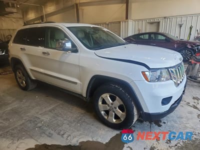 Czwarte zdjęcie samochodu z boku: 2013 JEEP GRAND CHEROKEE LIMITED VIN:1C4RJFBG0DC629554 - miniatura
