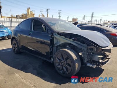 Czwarte zdjęcie samochodu z boku: 2022 TESLA MODEL Y VIN:7SAYGDEE2NF409753 - miniatura