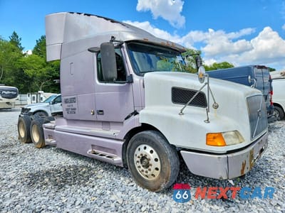 Czwarte zdjęcie samochodu z boku: 2003 VOLVO VN VNL VIN:4V4NC9GH53N346909 - miniatura