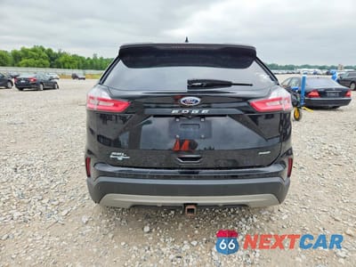 Zdjęcie 6 z 13 samochodu: 2022 FORD EDGE SEL VIN:2FMPK4J97NBA35889 - miniatura
