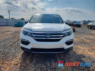 Piąte zdjęcie samochodu w środku: 2017 HONDA PILOT TOURING VIN:5FNYF5H93HB041432 - miniatura