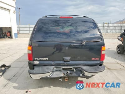 Zdjęcie 6 z 13 samochodu: 2000 GMC YUKON VIN:1GKEK13T3YJ196764 - miniatura