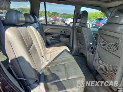 Zdjęcie 11 z 13 samochodu: 2005 HONDA PILOT EXL VIN:2HKYF18545H542896 - miniatura