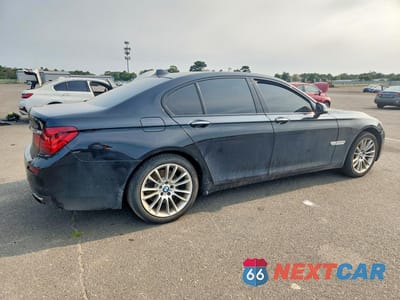 Trzecie zdjęcie samochodu z tyłu: 2015 BMW 740 I VIN:WBAYA6C53FG273294 - miniatura