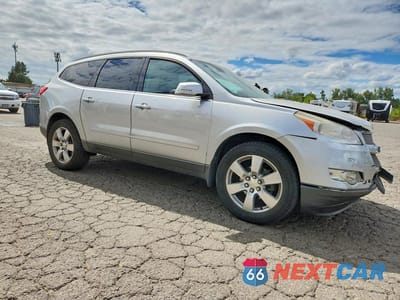 Czwarte zdjęcie samochodu z boku: 2012 CHEVROLET TRAVERSE LTZ VIN:1GNKVLED1CJ135324 - miniatura