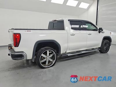 Trzecie zdjęcie samochodu z tyłu: 2019 GMC SIERRA K1500 SLT VIN:3GTU9DED9KG146440 - miniatura