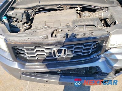 Zdjęcie 11 z 12 samochodu: 2013 HONDA RIDGELINE RTS VIN:5FPYK1F43DB004071 - miniatura