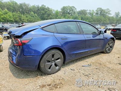 Trzecie zdjęcie samochodu z tyłu: 2023 TESLA MODEL 3 VIN:5YJ3E1EAXPF542403 - miniatura