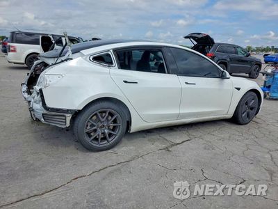 Trzecie zdjęcie samochodu z tyłu: 2023 TESLA MODEL 3 VIN:5YJ3E1EB5PF388143 - miniatura