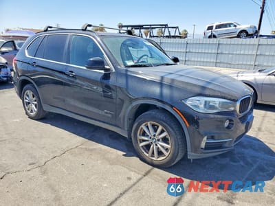 Czwarte zdjęcie samochodu z boku: 2014 BMW X5 SDRIVE35I VIN:5UXKR2C57E0H33933 - miniatura