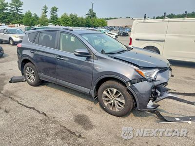 Czwarte zdjęcie samochodu z boku: 2018 TOYOTA RAV4 HYBRID XLE VIN:JTMRJREV0JD240852 - miniatura