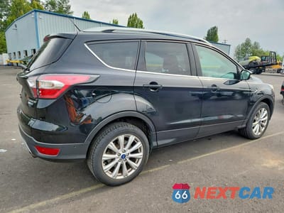 Trzecie zdjęcie samochodu z tyłu: 2017 FORD ESCAPE TITANIUM VIN:1FMCU9JD0HUB08223 - miniatura