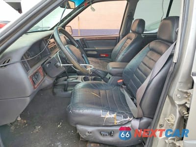 Zdjęcie 7 z 13 samochodu: 1998 JEEP GRAND CHEROKEE LAREDO VIN:1J4GZ58Y2WC157042 - miniatura
