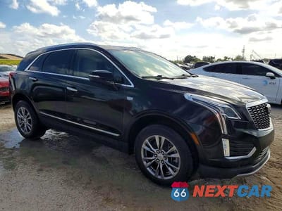 Czwarte zdjęcie samochodu z boku: 2021 CADILLAC XT5 PREMIUM LUXURY VIN:1GYKNCRS0MZ173433 - miniatura