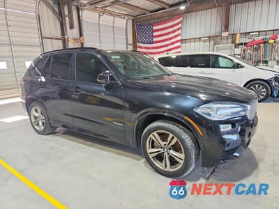Czwarte zdjęcie samochodu z boku: 2014 BMW X5 XDRIVE50I VIN:5UXKR6C50E0J71698 - miniatura