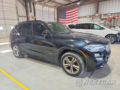 Czwarte zdjęcie samochodu z boku: 2014 BMW X5 XDRIVE50I VIN:5UXKR6C50E0J71698 - miniatura