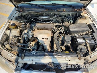 Zdjęcie 11 z 12 samochodu: 2000 TOYOTA CAMRY LE VIN:JT2BG22K5Y0400994 - miniatura