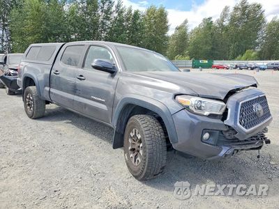 Czwarte zdjęcie samochodu z boku: 2019 TOYOTA TACOMA TRD OFF-ROAD VIN:3TMDZ5BN5KM075273 - miniatura