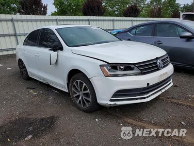 Czwarte zdjęcie samochodu z boku: 2018 VOLKSWAGEN JETTA SE VIN:3VWB67AJXJM240496 - miniatura
