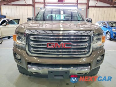 Piąte zdjęcie samochodu w środku: 2016 GMC CANYON SLT VIN:1GTP6DE10G1325113 - miniatura