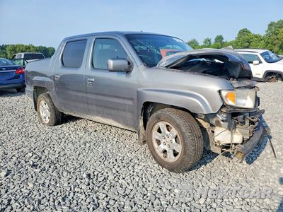Czwarte zdjęcie samochodu z boku: 2009 HONDA RIDGELINE RTS VIN:5FPYK16469B103331 - miniatura