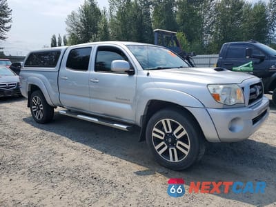 Czwarte zdjęcie samochodu z boku: 2005 TOYOTA TACOMA DOUBLE CAB LONG BED VIN:5TEMU52N75Z124740 - miniatura