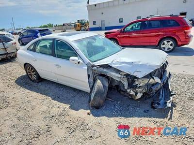Czwarte zdjęcie samochodu z boku: 2009 HYUNDAI AZERA GLS VIN:KMHFC46D39A349918 - miniatura