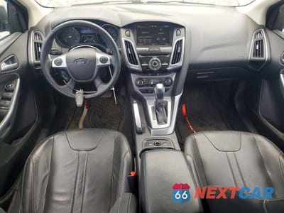 Zdjęcie 8 z 13 samochodu: 2014 FORD FOCUS TITANIUM VIN:1FADP3J27EL101403 - miniatura