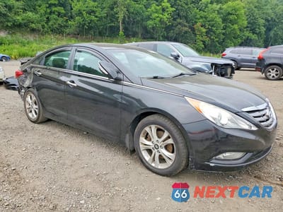Czwarte zdjęcie samochodu z boku: 2011 HYUNDAI SONATA LIMITED VIN:5NPEC4AC8BH119613 - miniatura
