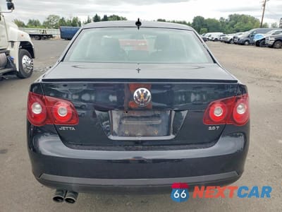 Zdjęcie 6 z 12 samochodu: 2010 VOLKSWAGEN JETTA WOLFSBURG VIN:3VWRJ7AJ4AM019473 - miniatura