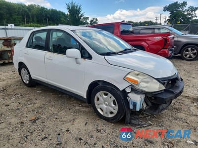 Czwarte zdjęcie samochodu z boku: 2010 NISSAN VERSA 1.8 S VIN:3N1BC1AP6AL409452 - miniatura