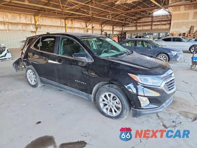Czwarte zdjęcie samochodu z boku: 2018 CHEVROLET EQUINOX LT VIN:3GNAXJEV6JL309557 - miniatura