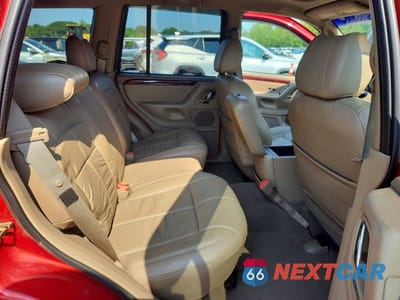 Zdjęcie 11 z 13 samochodu: 2002 JEEP GRAND CHEROKEE LIMITED VIN:1J4GW58N82C202381 - miniatura