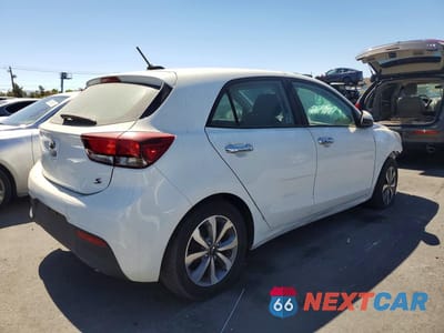 Trzecie zdjęcie samochodu z tyłu: 2021 KIA RIO S VIN:3KPA25AD1ME383702 - miniatura