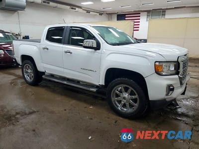 Czwarte zdjęcie samochodu z boku: 2022 GMC CANYON DENALI VIN:1GTG6EEN3N1140799 - miniatura