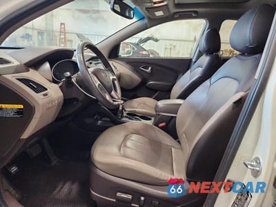 Zdjęcie 7 z 13 samochodu: 2012 HYUNDAI TUCSON LIMITED VIN:KM8JUCAC7CU543924 - miniatura