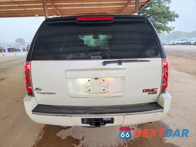 Zdjęcie 6 z 13 samochodu: 2011 GMC YUKON DENALI VIN:1GKS1EEF0BR205417 - miniatura