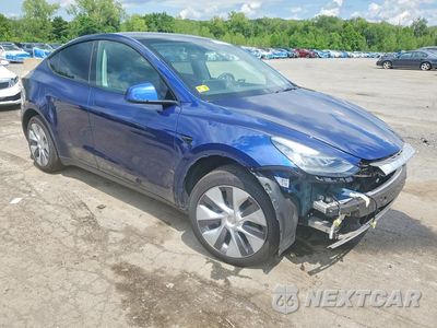 Czwarte zdjęcie samochodu z boku: 2023 TESLA MODEL Y VIN:7SAYGDEEXPA024201 - miniatura