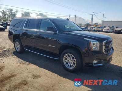 Czwarte zdjęcie samochodu z boku: 2019 GMC YUKON XL K1500 SLT VIN:1GKS2GKC2KR307708 - miniatura