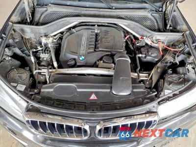 Zdjęcie 11 z 12 samochodu: 2014 BMW X5 SDRIVE35I VIN:5UXKR2C53E0C00459 - miniatura