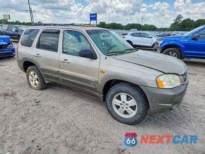 Czwarte zdjęcie samochodu z boku: 2001 MAZDA TRIBUTE LX VIN:4F2YU091X1KM60985 - miniatura