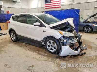 Czwarte zdjęcie samochodu z boku: 2014 FORD ESCAPE SE VIN:1FMCU9GXXEUB65543 - miniatura