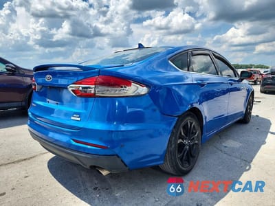 Trzecie zdjęcie samochodu z tyłu: 2019 FORD FUSION SE VIN:3FA6P0HD1KR285622 - miniatura