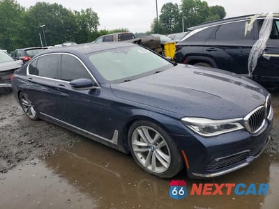 Czwarte zdjęcie samochodu z boku: 2018 BMW 750 XI VIN:WBA7F2C58JG423821 - miniatura