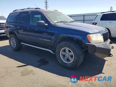 Czwarte zdjęcie samochodu z boku: 2000 JEEP GRAND CHEROKEE LAREDO VIN:1J4GW48S1YC195685 - miniatura
